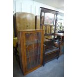 An oak hallstand and a walnut display cabinet