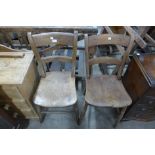 A pair of Victorian elm and beech kitchen chairs