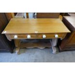 A Victorian pine two drawer washstand