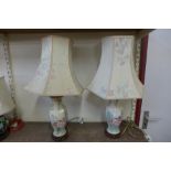 A pair of floral design porcelain table lamps