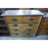 An Edward VII beech chest of drawers