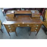 An Edward VII marquetry inlaid mahogany writing desk