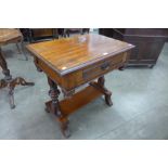 A Victorian walnut single drawer side table