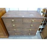 A Victorian scumbled pine chest of drawers
