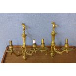 A pair of early 20th Century gilt metal wall sconces