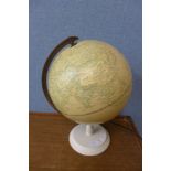 A terrestrial globe table lamp