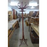 A painted bentwood coat stand