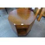 An Art Deco oak octagonal occasional table