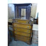 An oak chest of drawers and a Stag Minstrel nest of tables