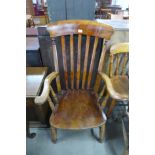 A Victorian elm and beech farmhouse armchair