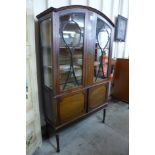 An Edward VII Sheraton Revival painted mahogany display cabinet