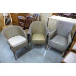 Three Lloyd Loom wicker armchairs