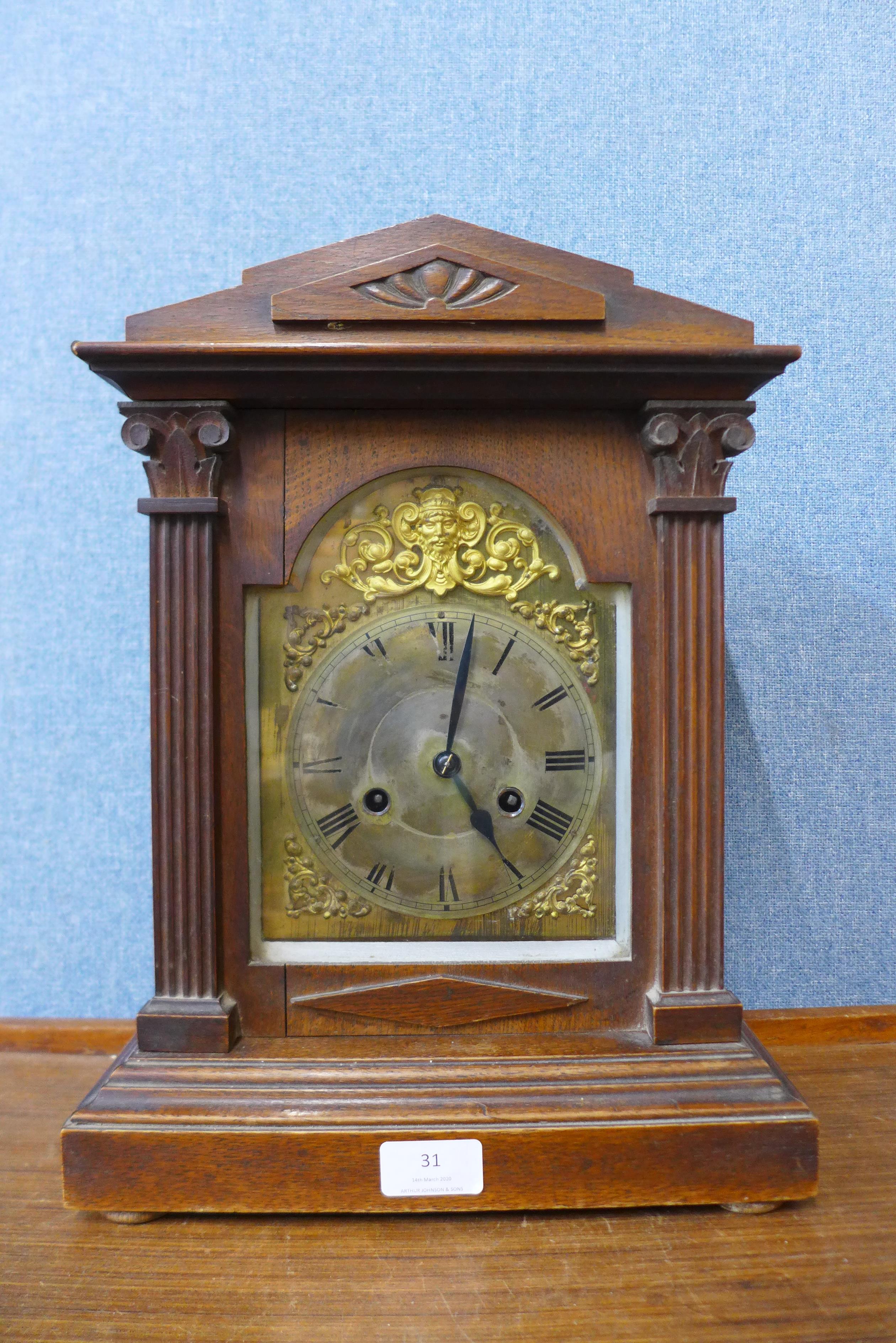 A 19th Century German oak mantel clock