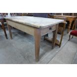 A pine single drawer kitchen table