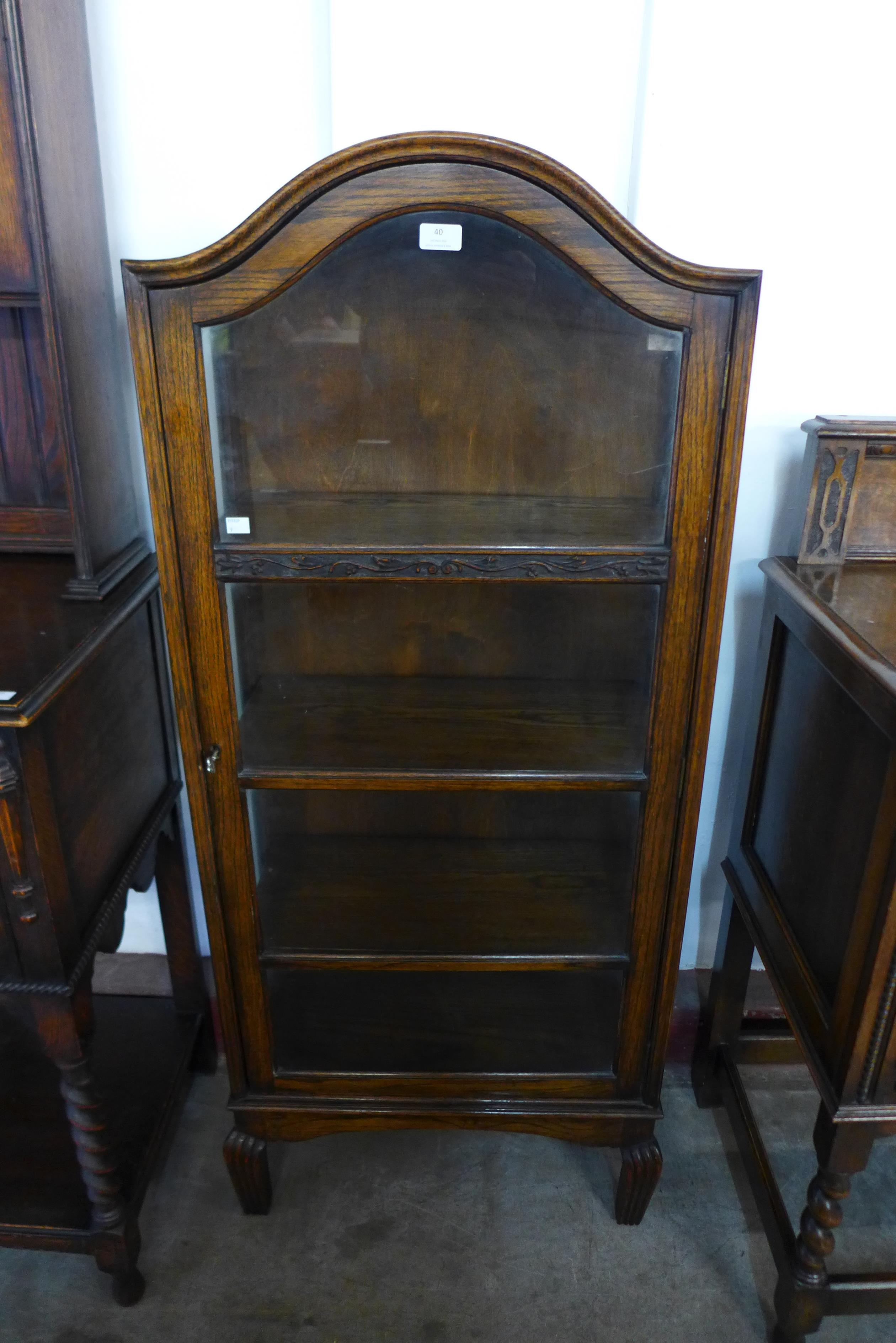 An oak display cabinet