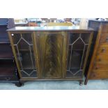 A mahogany side by side bookcase