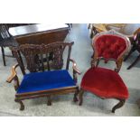 A Chippendale Revival mahogany child's settee and a Victorian mahogany nursing chair