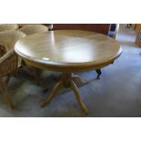 A beech circular breakfast table