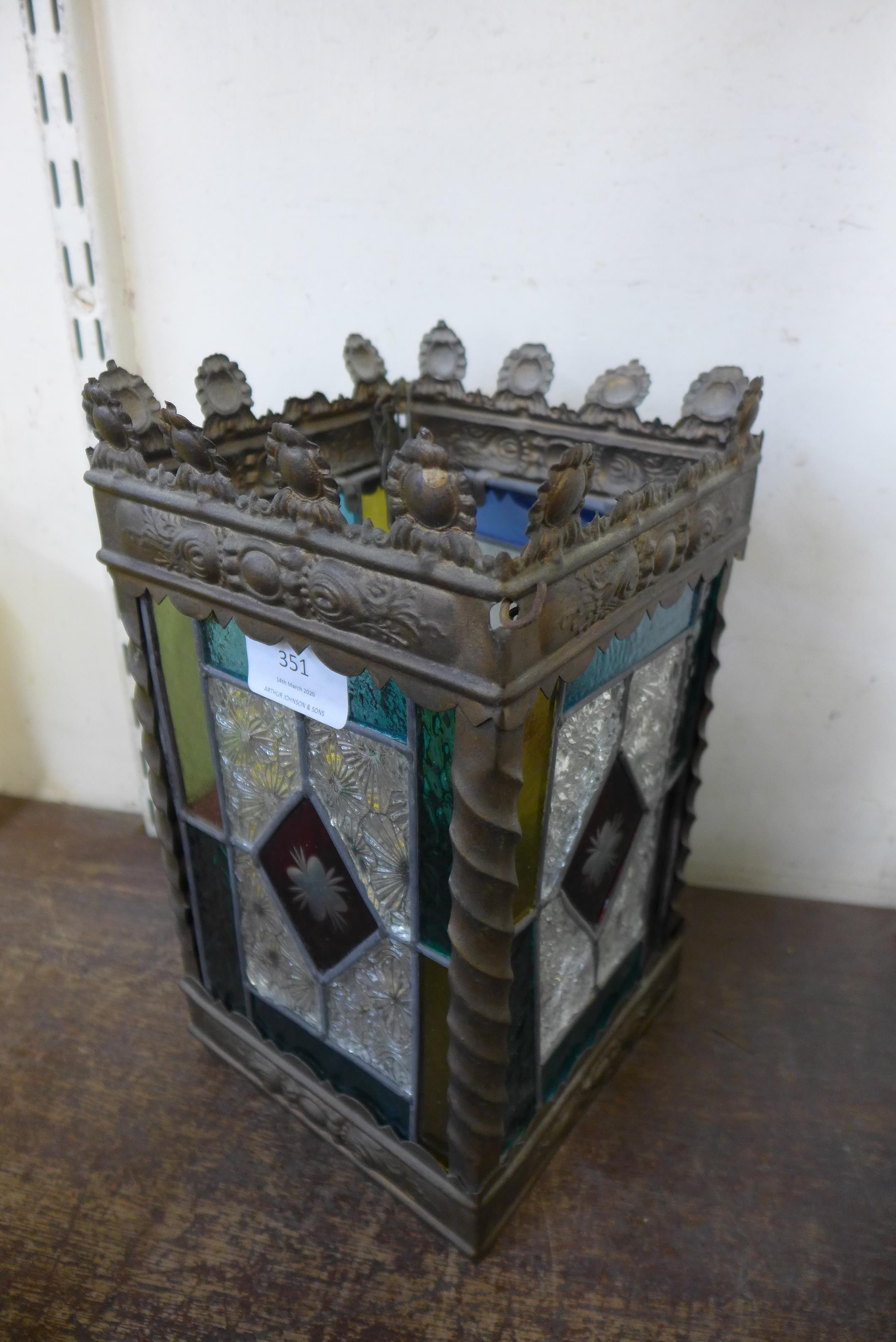 A stained glass hanging lantern