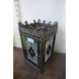 A stained glass hanging lantern