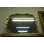 A gilt framed overmantel mirror