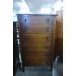 An oak chest of drawers