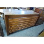 A large oak chest of drawers