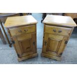 A pair of pine bedside cabinets