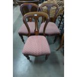 A set of three Victorian mahogany balloon back dining chairs