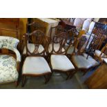 A set of six Hepplewhite style mahogany dining chairs