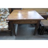 A mahogany and oak single drawer table