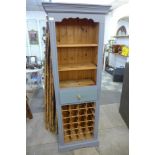 A painted pine bookcase/wine rack