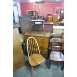 Two Ercol chairs and an oak chest of drawers (chest a/f)