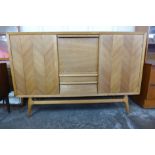 A light oak herringbone pattern sideboard