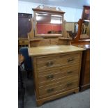An Edward VII satin birch dressing chest
