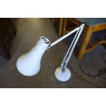 A white metal anglepoise lamp