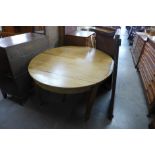 An Edward VII mahogany extending dining table