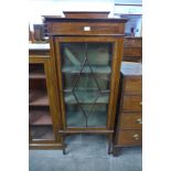 An Edward VII inlaid mahogany display cabinet