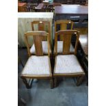 A set of four oak dining chairs