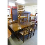 An oak refectory table and five chairs