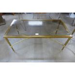 An Italian brass and glass topped rectangular coffee table