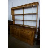 A pine dresser and a pine Delft rack