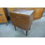 A teak bedside cabinet