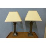 A pair of metal table lamps