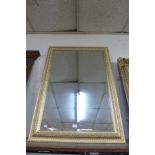 A gilt framed mirror