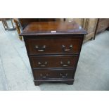 A small mahogany chest of drawers