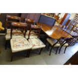 A Regency style inlaid mahogany extending pedestal table and a set of six Regency style mahogany