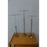 Three steel haberdashery shop stands