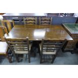 An oak refectory table and four chairs