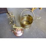 A copper kettle, brass coal scuttle and companion set